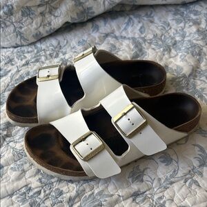 Birkenstock White Sandals with Gold Buckles